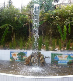 Clear Water Flowing Around and Waterwheel Running Day and Night